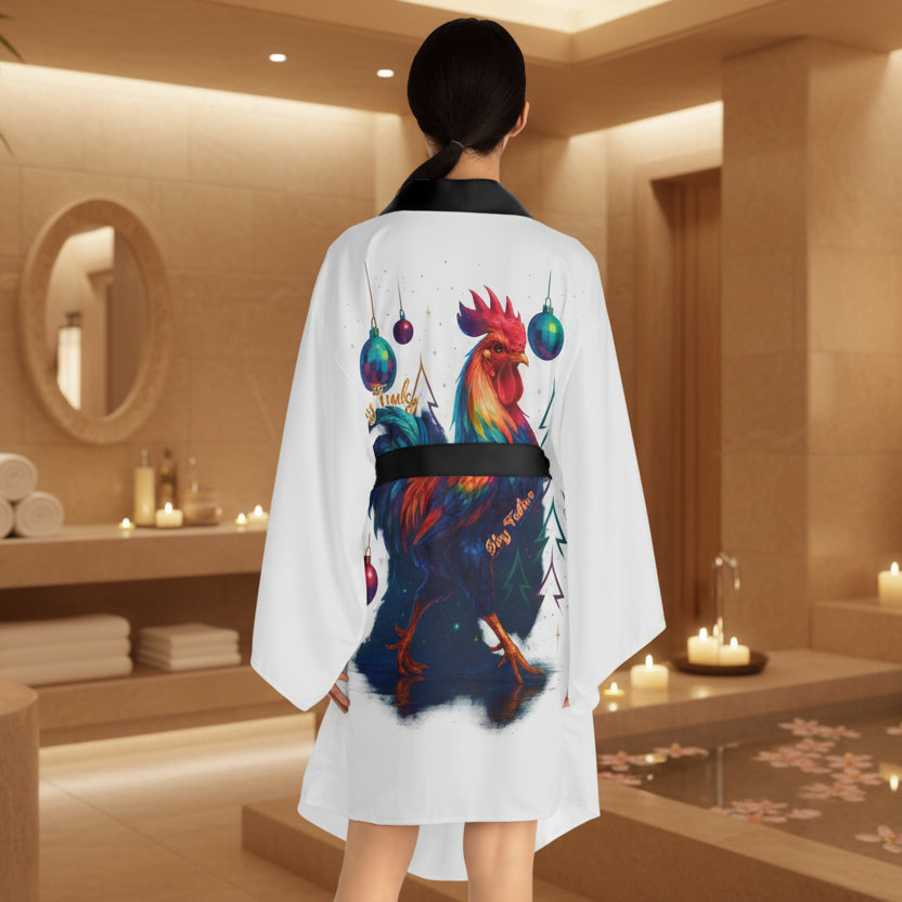 Woman wearing a white kimono-style garment with a colorful rooster design on the back.